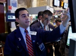 El Dow Jones reportaba un avance de 21.83 puntos esta mañana. AP /