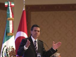 Hoy México está buscando diversificar sus exportaciones, ampliar otros horizontes y otros mercados, afirmó el Presidente Peña Nieto. EFE /