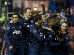 El United avanza en esta competencia, donde sí tuvo participación Hernández. AP /