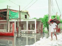 Al menos nueve municipios reportan afectaciones y daños a carreteras por las intensas precipitaciones. ARCHIVO /