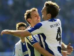Los catalanes celebran su triunfo, un respiro al cierre de 2013. EFE /