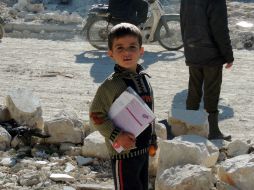 El número de niños sirios que requiere asistencia humanitaria urgente aumentó a 5.5 millones, alertó UNICEF. AFP /