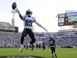 Nate Washington (85) celebra la anotación con la que Tennessee consiguió la victoria. AP /