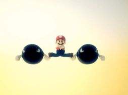 El personaje realiza su split encima de dos de sus enemigos en uno de sus videojuegos. ESPECIAL /