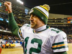 Rodgers acaba de volver y logró que su equipo se llevara el título divisional. AP /
