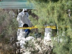 Al lugar acudió un agente del Ministerio Público y personal del Instituto Jalisciense de Ciencias Forenses. ARCHIVO /