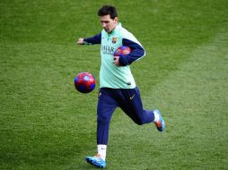 Lionel Messi regresó de Argentina y volvió a los entrenamientos con sus compañeros del Barcelona. AP /