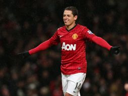El valor del 'Chicharito' es muy similar al de Juan Mata, lo que facilitaría una eventual transacción. Tomada de Twitter @ManUtd_Es. ESPECIAL /