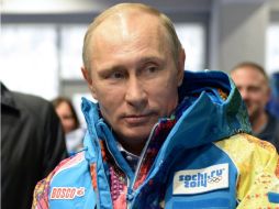 Vladimir Putin, durante una visita al centro de entrenamiento para voluntarios de las Olimpiadas de Invierno. AP /