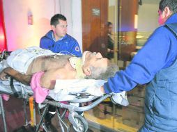 El traslado. José Manuel Mireles, al llegar a Morelia; después lo llevaron al Distrito Federal. AP /