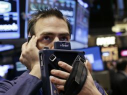 En los primeros días de este 2014 se han registrado diversos descensos en la bolsa de Nueva York. AP /
