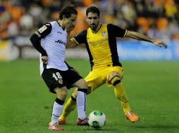 Guardado tuvo una buena participación en el duelo ante los Colchoneros. AFP /
