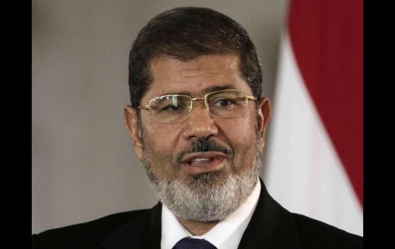 Morsi y otras 14 personas están acusadas de incitar a la matanza de manifestantes frente al palacio presidencial de El Cairo en 2012. ARCHIVO /