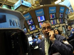 El Nasdaq Composite fue el único índice de la bolsa que reporta una ligera alza de 1.84 puntos. ARCHIVO /