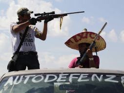 La investigación que realiza la CNDH sobre las autodefensas en Michoacán han constatado su presencia en 20 municipios. ARCHIVO /