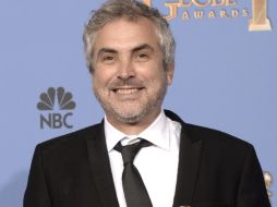 Alfonso Cuarón triunfa en los Globos de Oro a Mejor Director por su filme 'Gravedad'. AFP /