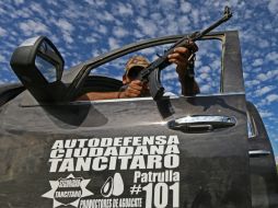 El secretario de Gobernación hace un llamado para que los grupos de autodefensa regresen a sus lugares de origen. EFE /