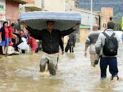 Prevén que las lluvias continúen por las próximas horas mientras que se evalúan las zonas para prevenir desbordamientos. ARCHIVO /