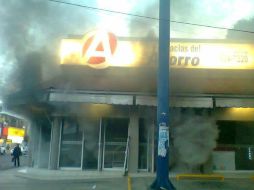 De acuerdo con reportes, la farmacia fue atacada poco después de las siete de la mañana de este miércoles. Foto: Guardia civil SDR. ESPECIAL /