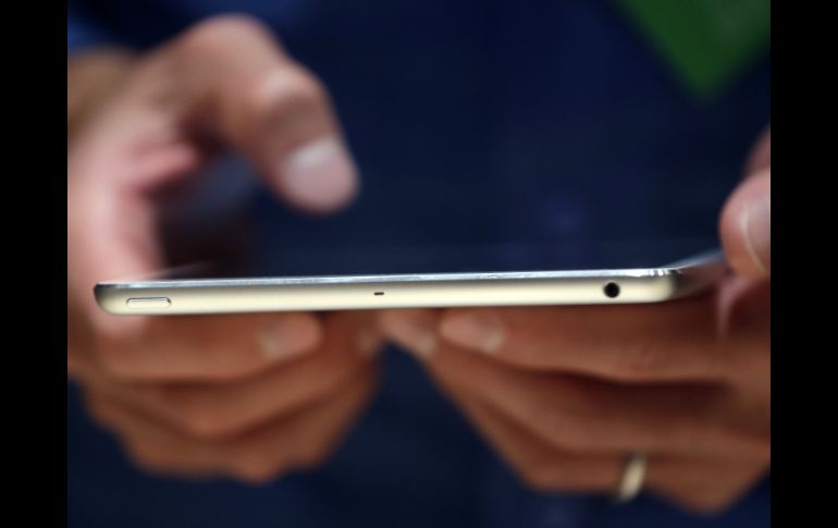 Muchas aplicaciones para el iPhone y la tableta iPad permiten la compra de objetos o dinero virtual. ARCHIVO /