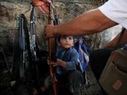 El alto índice de violencia que viven estados, como Michoacán, tiene efectos diversos. Los jóvenes emigran para seguir estudiando. AP /