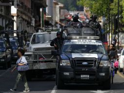 Policías federales y militares mantienen blindada la mayoría de municipios michoacanos. EFE /