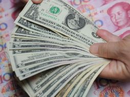 Prevé que el dólar podría irse a los 14 pesos sin que sea motivo de alarma. ARCHIVO /