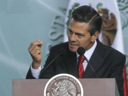 Enrique Peña Nieto asegura que la violencia y el crimen han reducido desde que asumió el poder en diciembre de 2012. ARCHIVO /