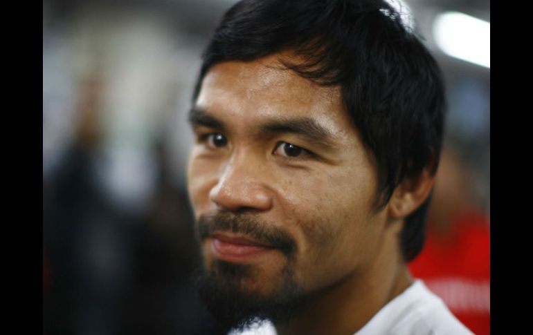 Pacquiao reta al estadounidense a que en el contrato se estipule que las ganancias del combate sean destinadas a obras de caridad. ARCHIVO /
