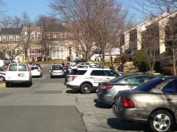 La policía de Germantown realiza investigaciones en el lugar donde fueron los homicidios. AP /