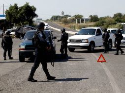 La Policía Federal realizan recorridos en los límites de Apatzingán y Parácuaro, donde ayer martes se registraron enfrentamientos. ARCHIVO /
