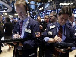 Al igual que ayer, Wall Street vuelve a tener un cierre con mixtos resultados. AP /
