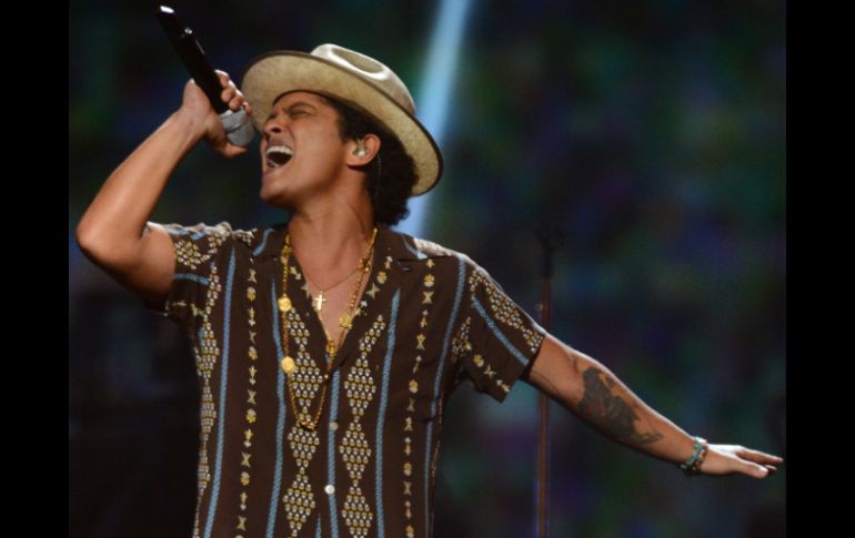 El cantante fue nombrado el artista del año por Billboard a finales de 2013. ARCHIVO /