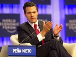El Presidente Peña Nieto, durante su participación en un panel durante la segunda jornada del Foro Económico Mundial. SUN /