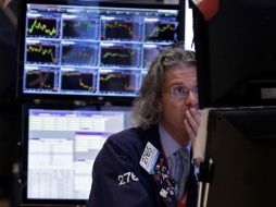 El Dow Jones registró pérdidas por tercer día consecutivo y tuvo su caída más importante en cuatro meses. AP /