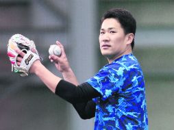 Masahiro Tanaka ayudó a que los Golden Eagles de Rakuten conquistara su primer título de la liga japonesa. AFP /