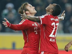 Mario Goetze (i) fue el autor del primer gol al minuto siete. AFP /