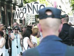 Las manifestaciones pacíficas se tornaban en violentos disturbios durante la noche y convertían el barrio en un campo de batalla.  /