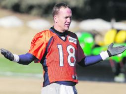 Peyton Manning es reconocido por sus compañeros como un líder capaz de leer la estrategia rival. AP /