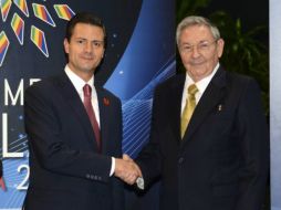 El Presidente Enrique Peña Nieto y su homólogo cubano, Raúl Castro, durante su participación en la II Cumbre de la Celac. SUN /