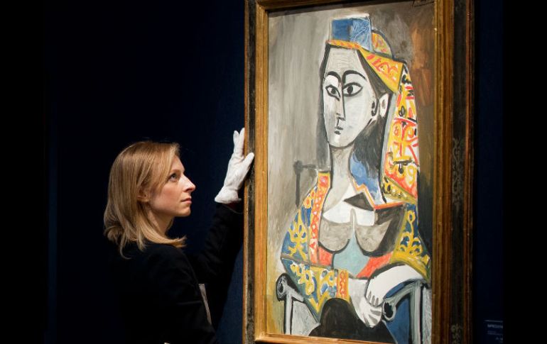 El cuadro se llama 'Femme au costume turc dans un fauteuil' que significa, 'Mujer de traje turco en un sillón'. AFP /