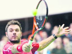 El suizo Stanislas Wawrinka se estrenó con triunfo en su primera serie como raqueta número uno de su país. AFP /