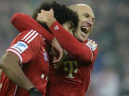 Arjen Robben (d) anotó el tercer tanto de los Bávaros al minuto 67. AFP /