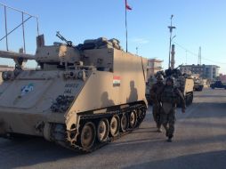 Militares realizan un cerco de seguridad en Ramadi luego de que Al Qaeda tomara el poblado de Faluya. AP /