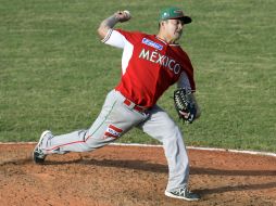 Efectivo. Juan Delgadillo permitió sólo cuatro imparables en siete entradas de labor, para acreditarse el triunfo. AFP /