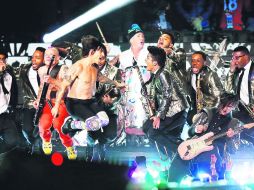 El momento más esperado fue cuando los descamisados Red Hot Chili Peppers se unieron a Bruno Mars sobre el escenario. AFP /