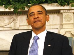 La aprobación al trabajo de Barack Obama sube cuatro puntos porcentuales en comparación a  noviembre y diciembre pasados. AP /