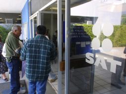 De acuerdo con las cifras del órgano recaudador son alrededor de 90 mil contribuyentes los que aparecen en la lista de incumplidos. ARCHIVO /