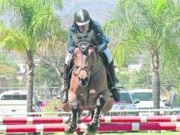 El binomio formado por Andrés Garciarce y ''Faro'' se impuso entre 23 competidores con recorrido limpio en un tiempo de 27.47 segundos.  /