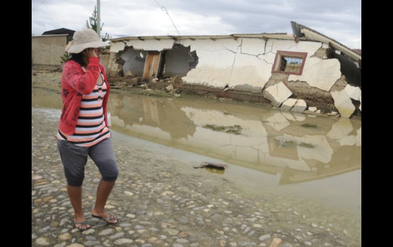 Se iniciará con la reconstrucción de casas, reconstrucción y apoyo a los cultivos afectados. AP /